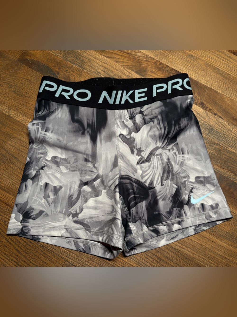 Nike Pro Women’s Gray Camo Compression Shorts with Light Blue Swoosh